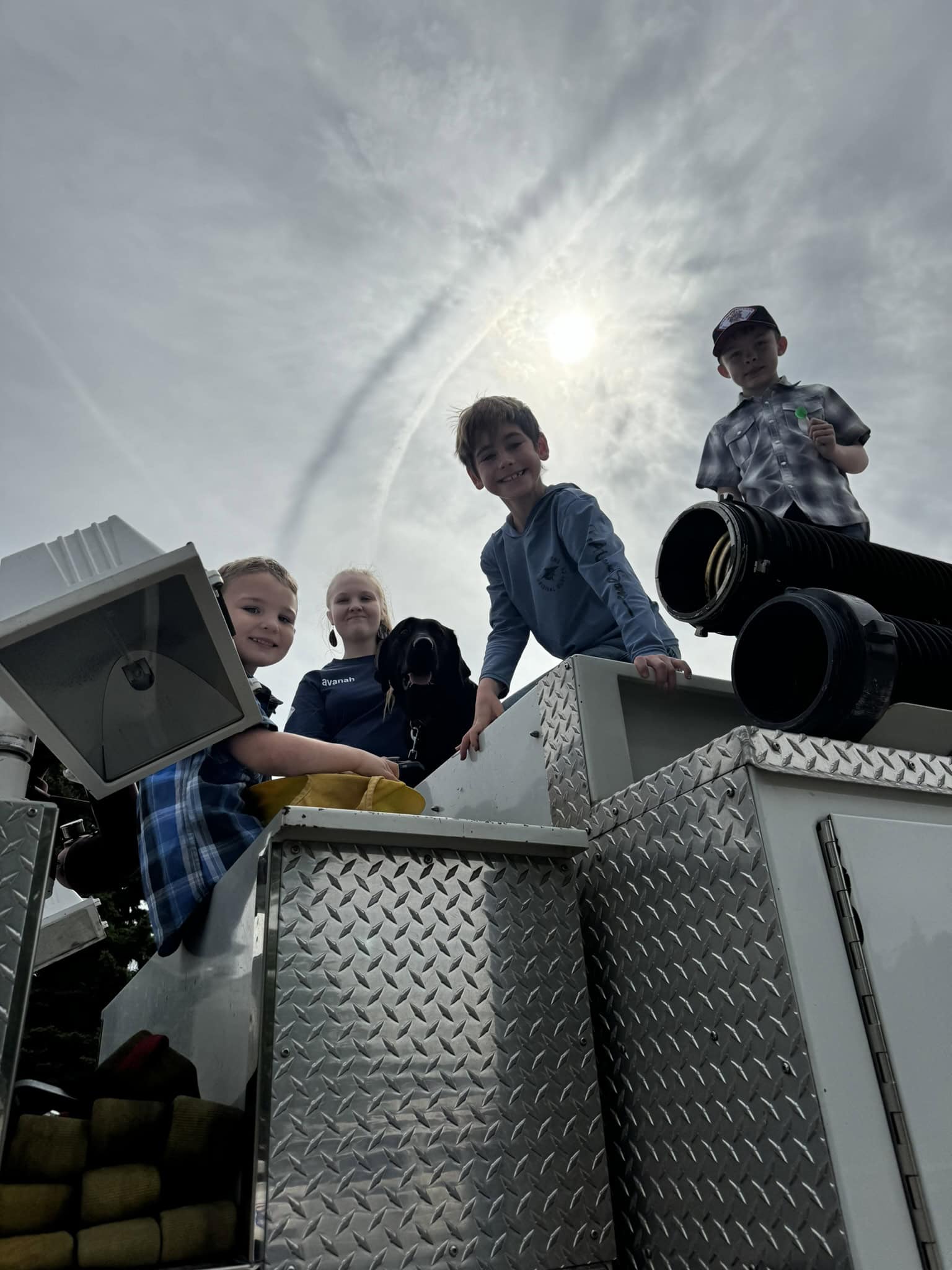 Youth on top of Fire Truck
