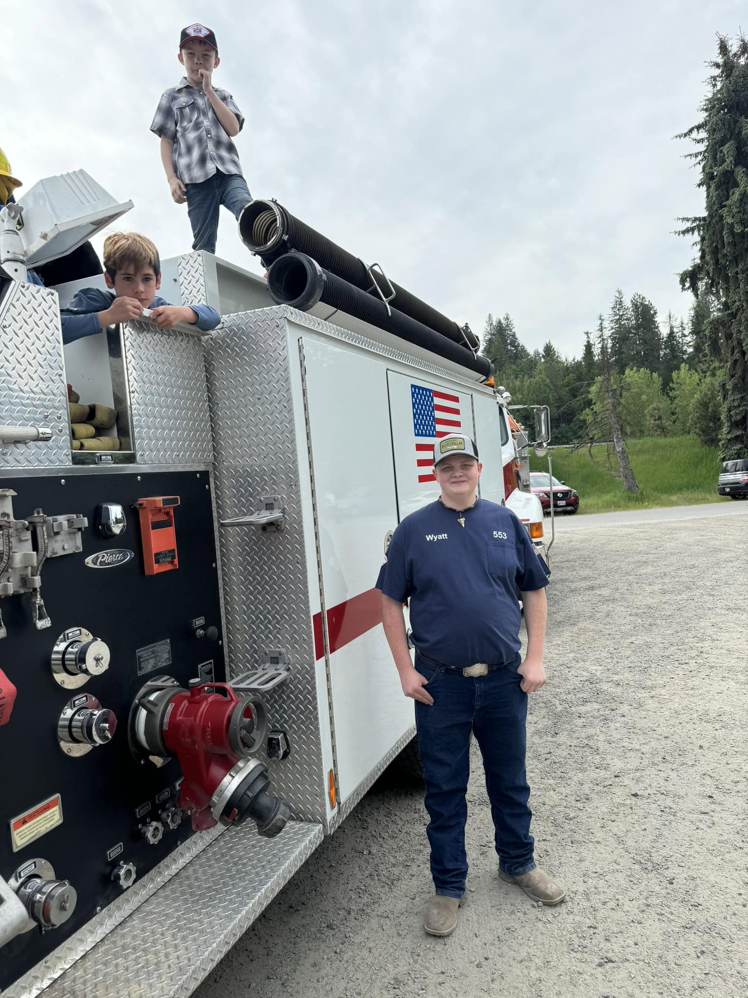 Youth by Fire Truck